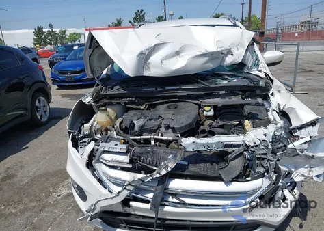 2017 Ford Escape Titanium z USA, uszkodzony, nr VIN 1FMCU0J91HUD85387